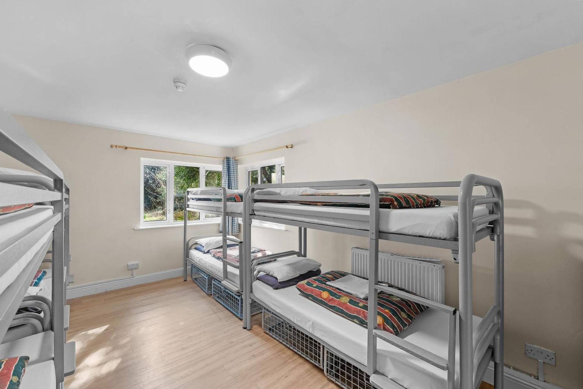 Bed in 8-Bed Female Dormitory Room