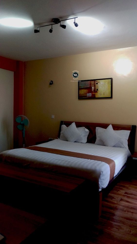 undefined WE Hotel and Suites 2