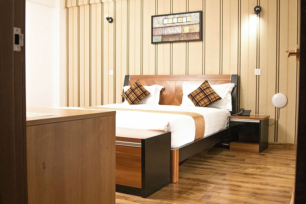 undefined WE Hotel and Suites