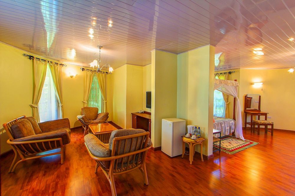 Poa Place Resort & Hotel - Where Nature Meets Comfort Deluxe Room with King Bed 5