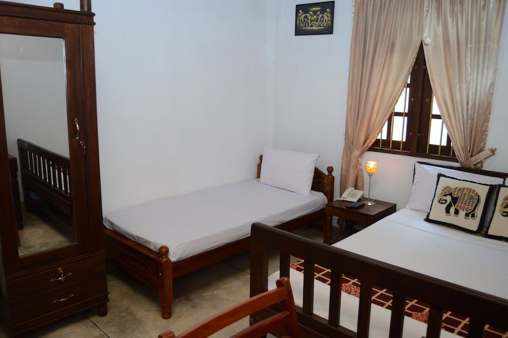 Muduna Walawwa Resort Deluxe Triple Room 4