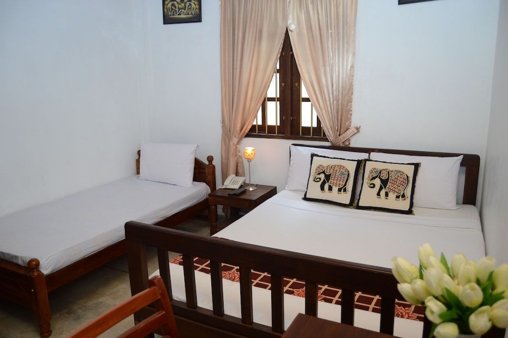 Muduna Walawwa Resort Deluxe Triple Room 2