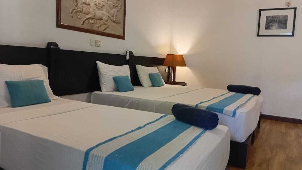 Deluxe Triple Room, Multiple Beds, Garden View