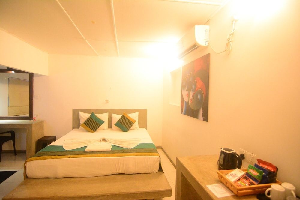 Kutumbaya Deluxe Triple Room 4