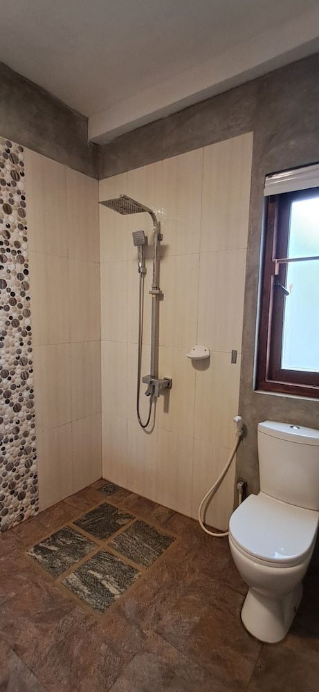 Kutumbaya Deluxe Quadruple Room 13