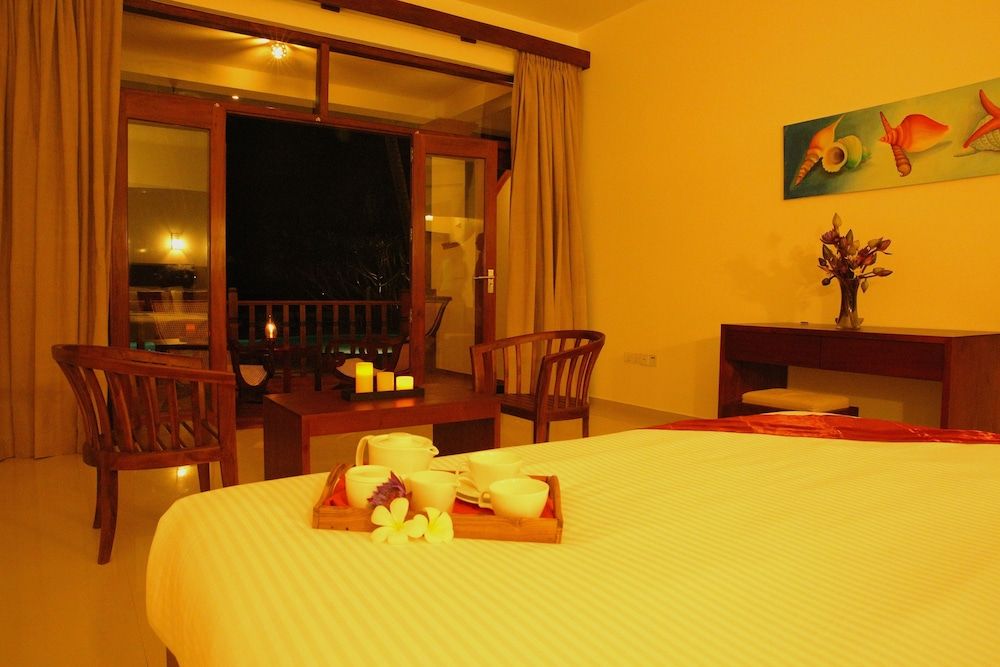 undefined Whispering Palms Hotel 6