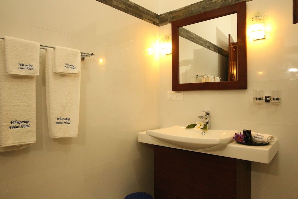 undefined Whispering Palms Hotel 9