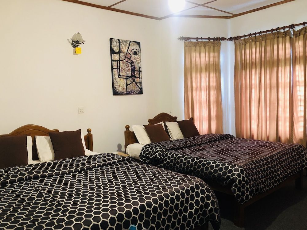 Royal Mount Hotel Quadruple Room 15