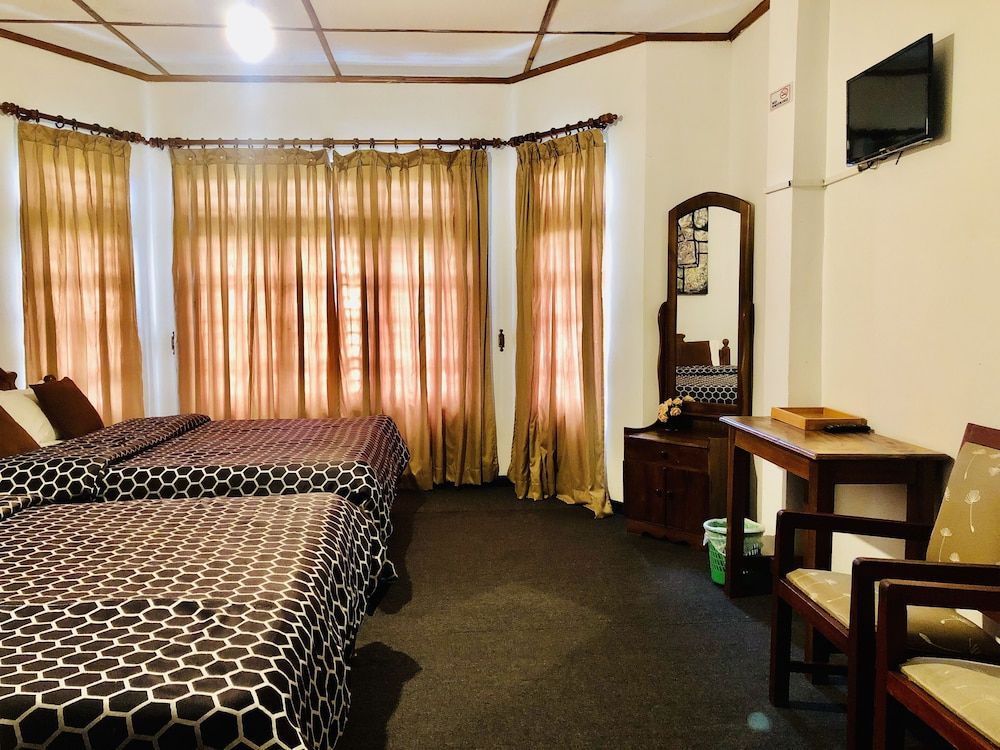 Royal Mount Hotel Quadruple Room 18