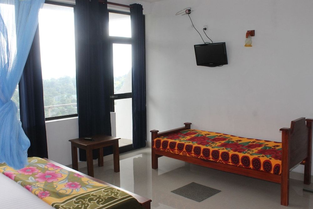 Pure Nature Hotel Deluxe Triple Room 8