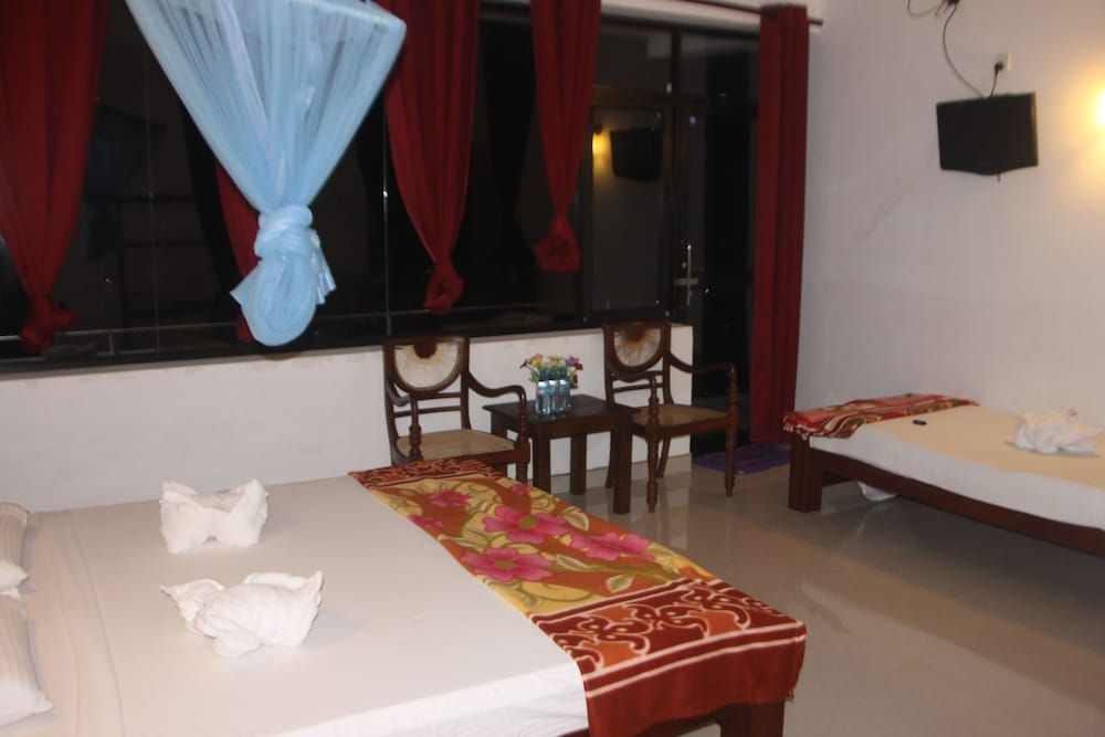Pure Nature Hotel Deluxe Triple Room 6