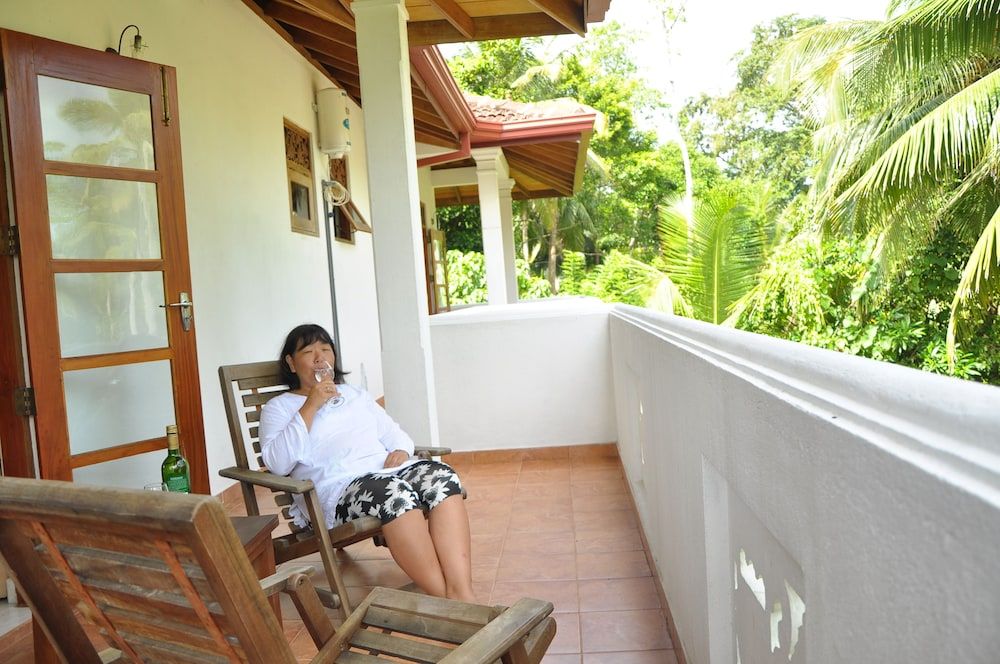 Sakura Villa Deluxe Double Room, Balcony, Garden View 4