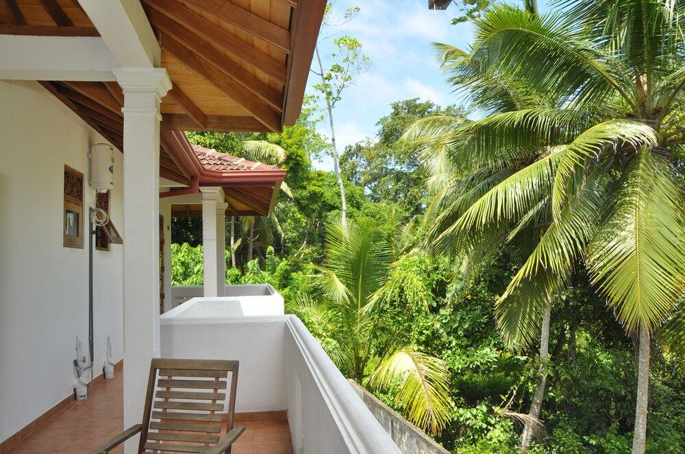 Sakura Villa Deluxe Double Room, Balcony, Garden View 5