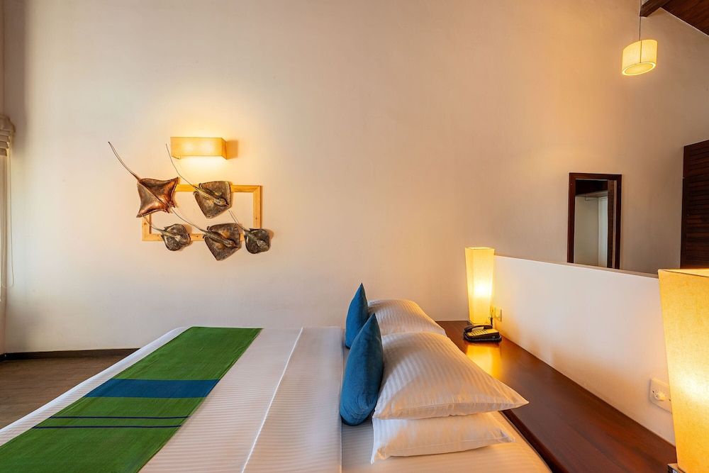 The Calm Resort & Spa Deluxe Double Room, 1 Bedroom, Partial Ocean View, Beachside 2