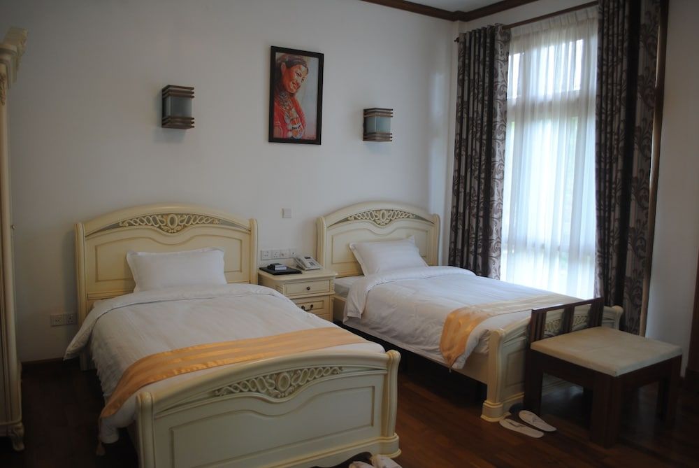 Myitkyina Plam Spring Resort Hotel Deluxe Bungalow 5