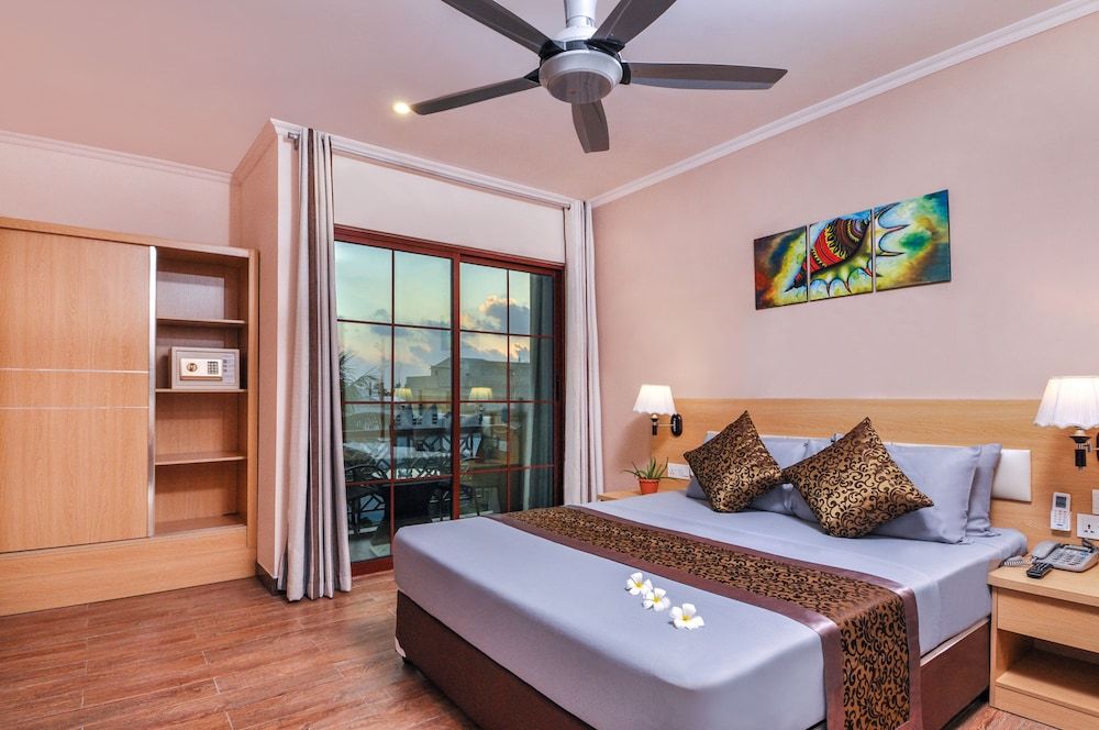 undefined Triton Beach Hotel & Spa