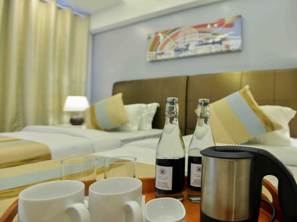 Coconut Tree Hulhuvilla Beach Family Room 2