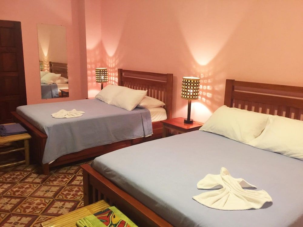 Deluxe Quadruple Room, 2 Queen Beds, Private Bathroom