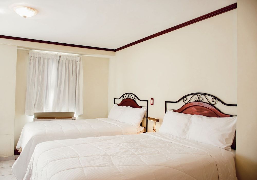 Hotel Gardenia Inn Habitacin estndar dos camas dobles, cocina bsica