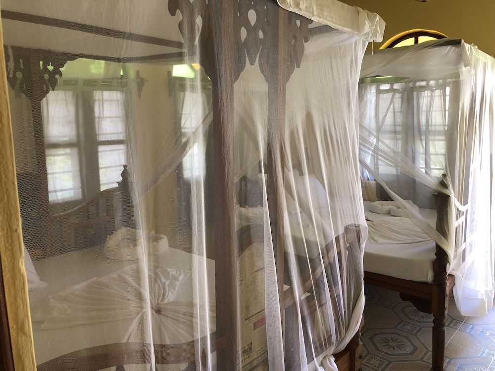 Blue Earth Beach Bungalows Family Quadruple Room, 2 Double Beds, Sea View