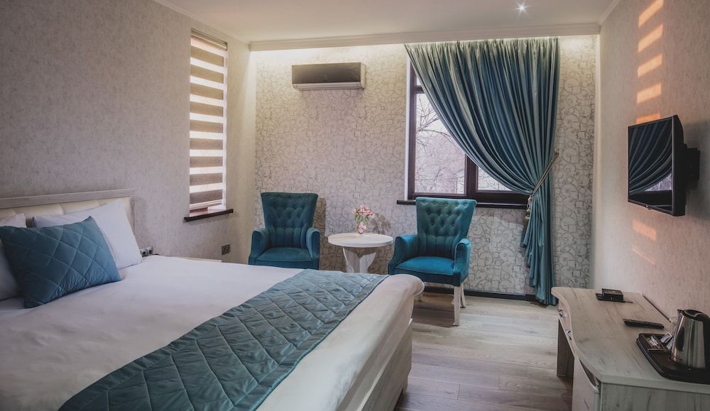 undefined Aster Hotel Group 4