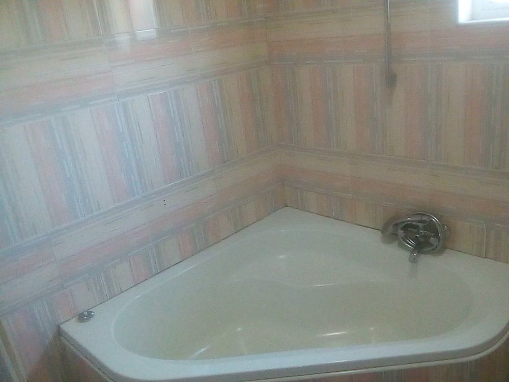 Royal Olympia Lodges and Safaris Deluxe Double Room, 1 King Bed, Pool View 4