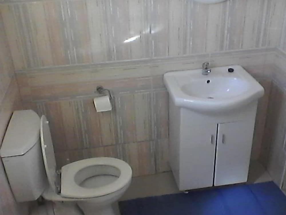 Royal Olympia Lodges and Safaris Deluxe Room 4