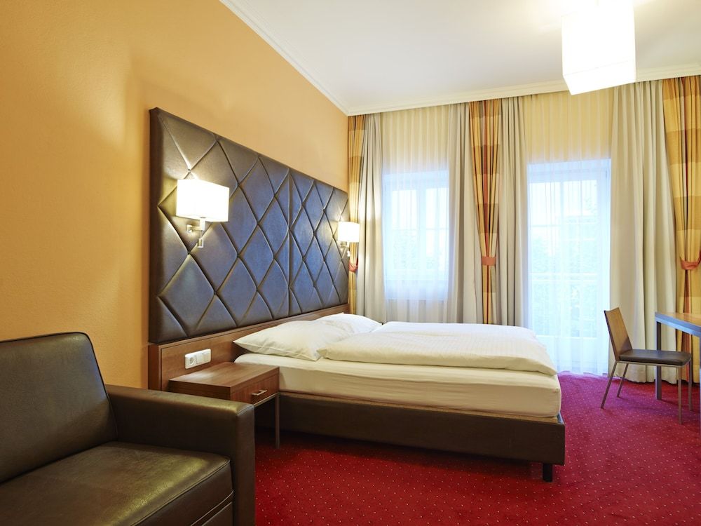 Villa Ceconi by Das Grüne Hotel zur Post Triple Room 4