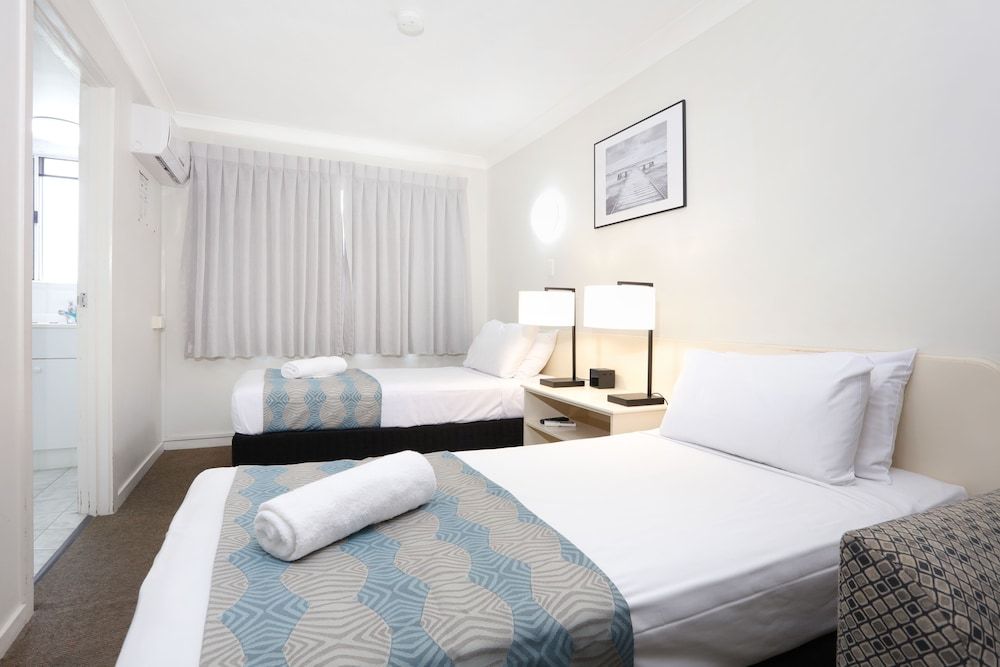 Motel Room (2 Single Beds + Double Sofa Bed)