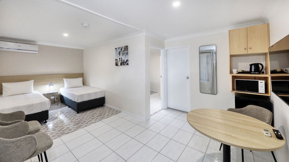 The Phoenix Artesian Spa Resort and Accommodation Essential Family Room 2