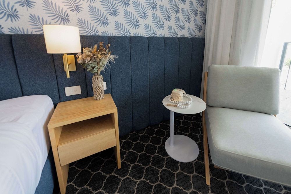 The Beachcomber Hotel & Resort, an Ascend Collection Resort Room, 1 King Bed, Poolside (Water View) 13