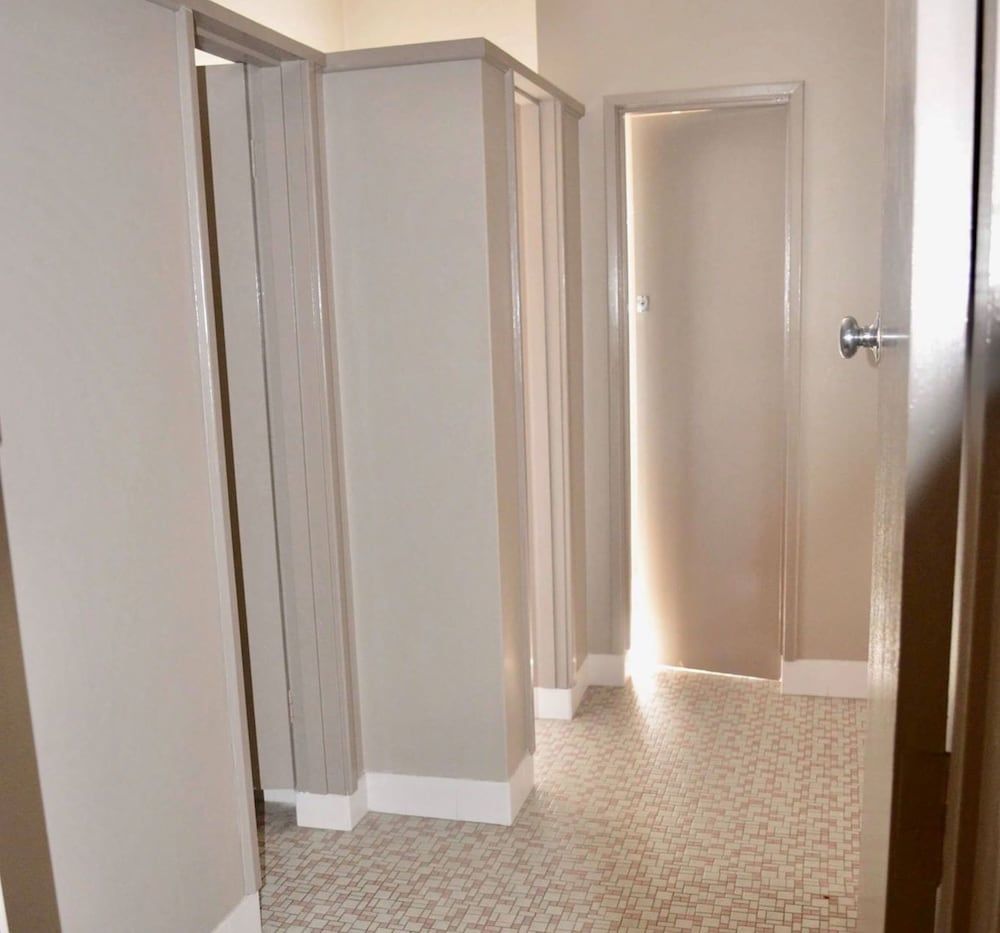 Economy Single Room, 1 Twin Bed, Non Smoking, Shared Bathroom