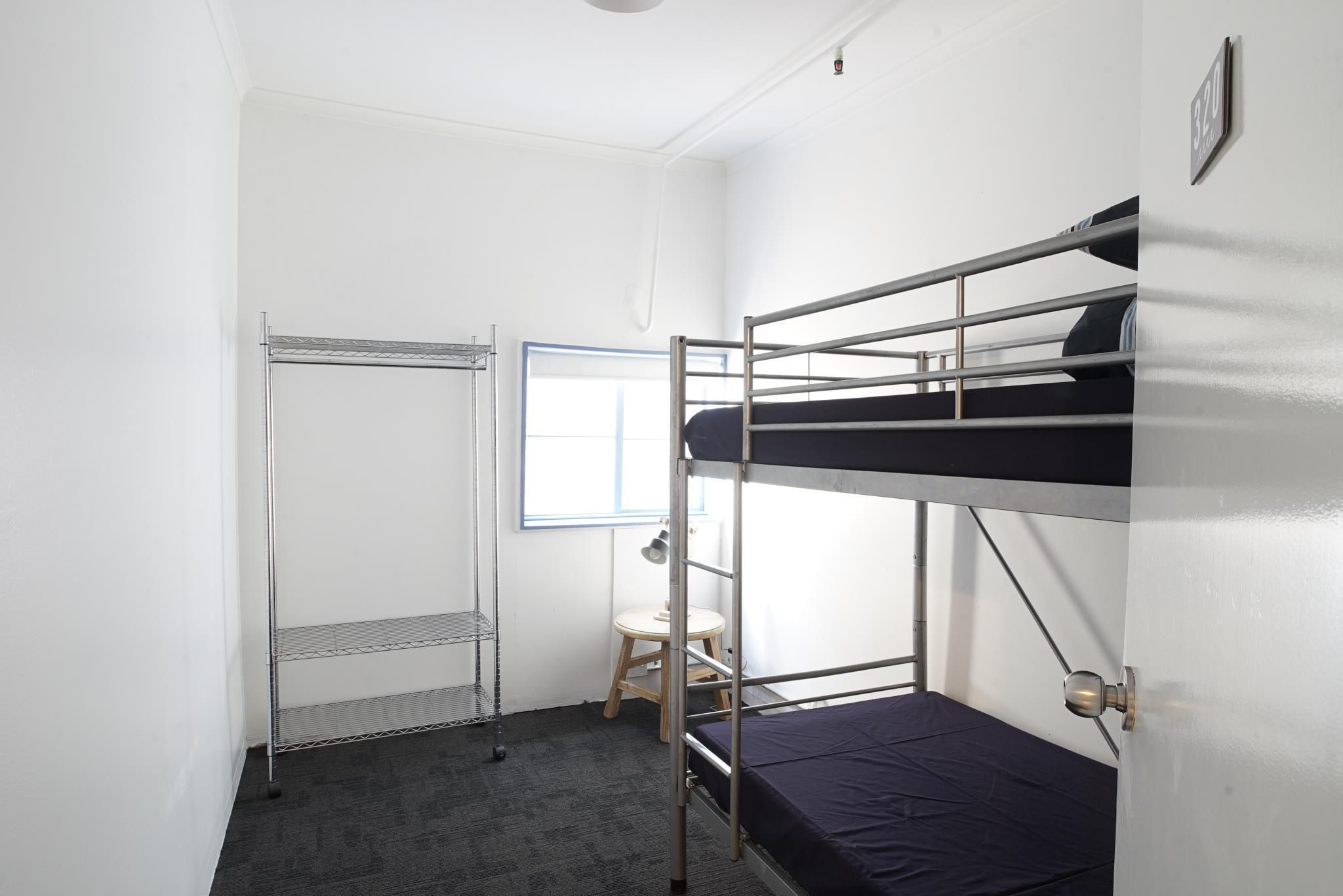 Twin Bed Shared Bathroom