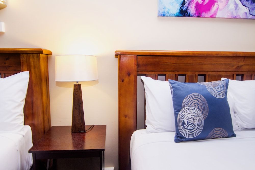 Crescent Motel Family Studio Suite, 2 Queen Beds, Refrigerator & Microwave 3