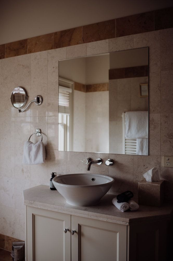 Grande Vue Private Hotel Deluxe Two-Bedroom Spa Suite with Water and Mountain Views 3