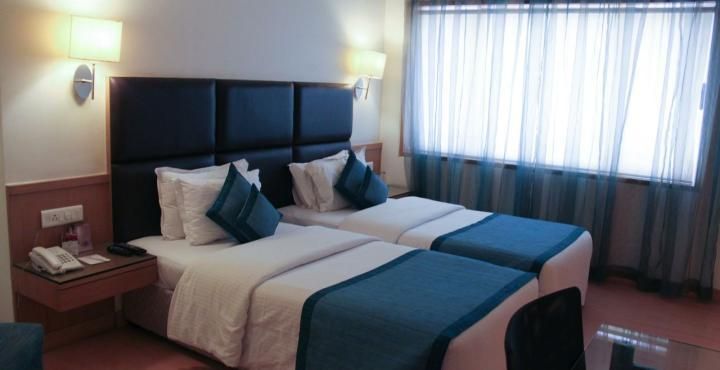 Minerva Grand - Banjara Premium Room Twin Bed 2