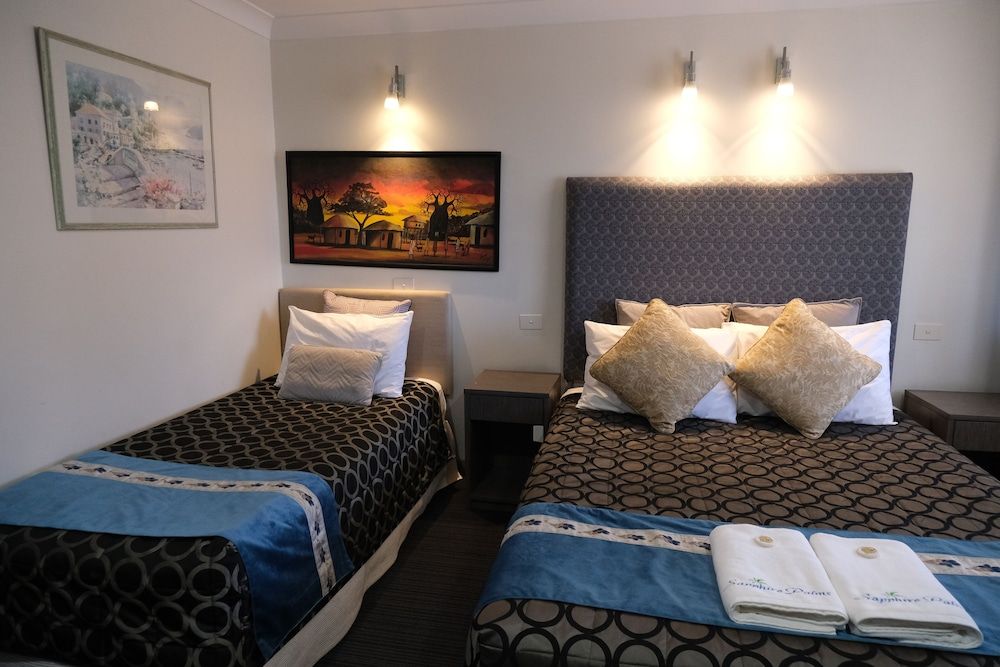 Premium Room - Ground Floor - 1 Queen Bed and 1 Single Bed