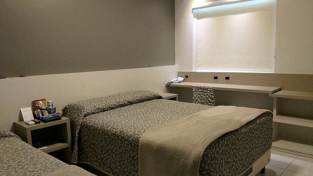 Quarto Triplo Standard -  3 Camas de Solteiro Ou 1 Cama de Casal e 1 Cama de Solteiro