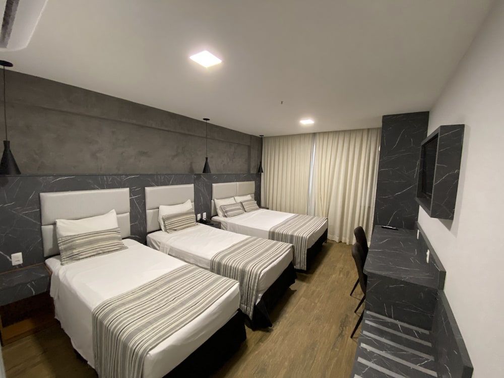 Deluxe Quadruple Room, City View