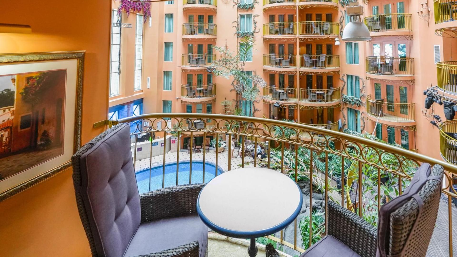 Interior Garden Balcony Family Suite, 2 Queen Beds and Sofa-Bed
