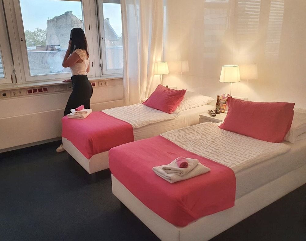 Business Hotel Prime Quadruple Room