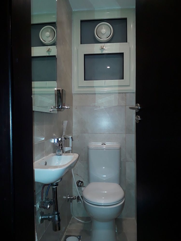 Raised toilet seat