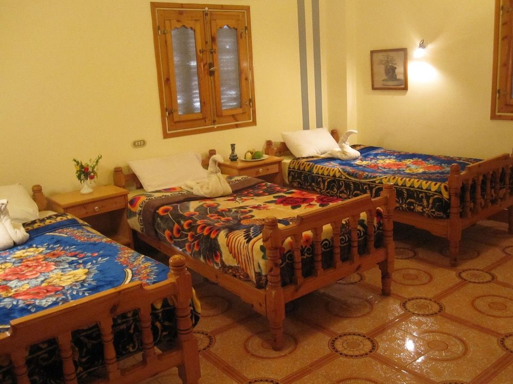 Amon Hotel Room (Deluxe Family Room, Garden View) 2