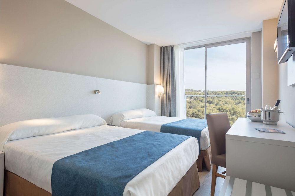Quadruple Room (3 Adults + 1 Child)