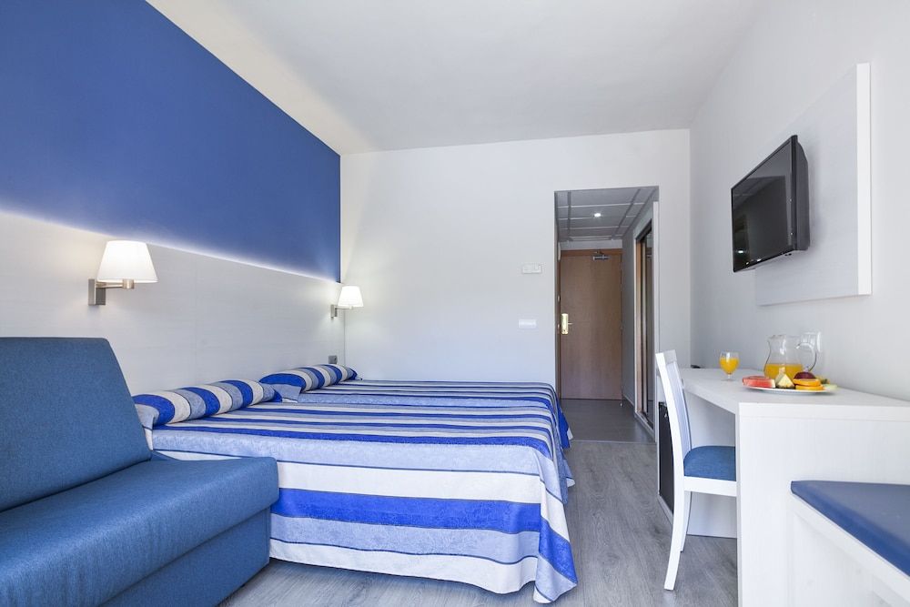 Triple Room (2 Adults + 1 Child)
