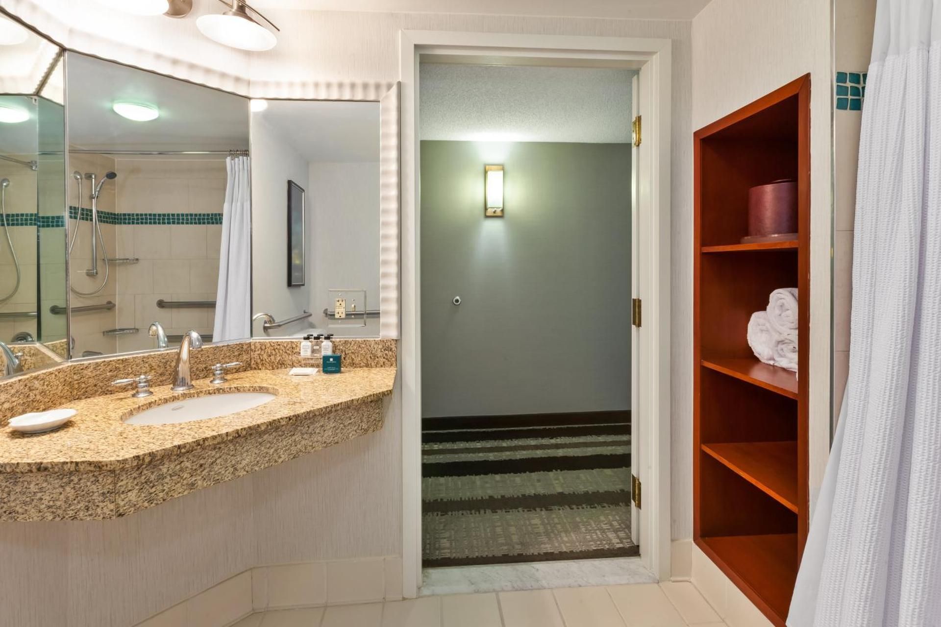 1 King Bed Standard Comm Access Roll Shower