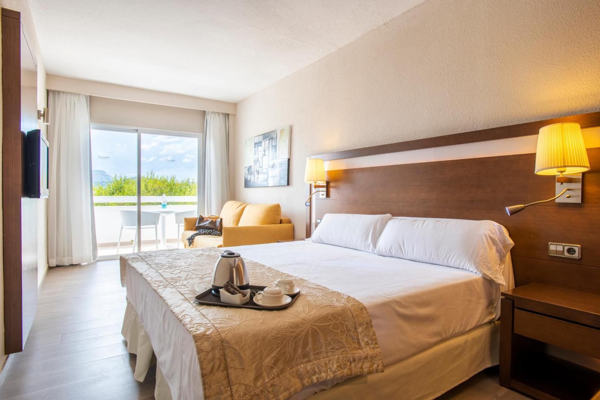 Junior Suite with Side Sea View (2 Adults + 1 Child)