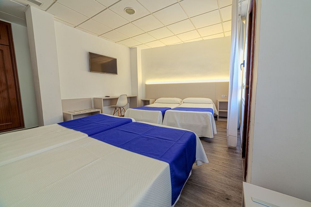 Hotel La Perla Family Room