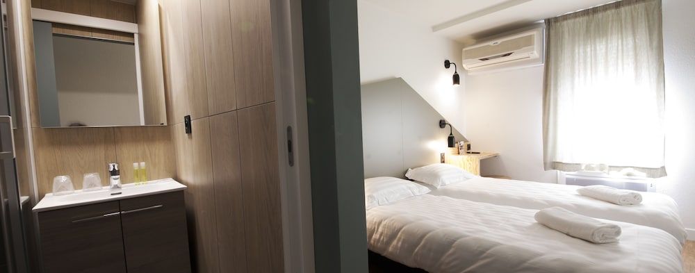 Brit Hotel Essentiel Arverne Clermont Sud Quadruple Room, Multiple Beds 3