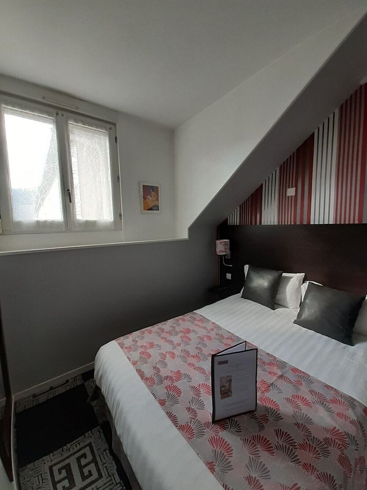 Hôtel Le Charleston Triple Room 5